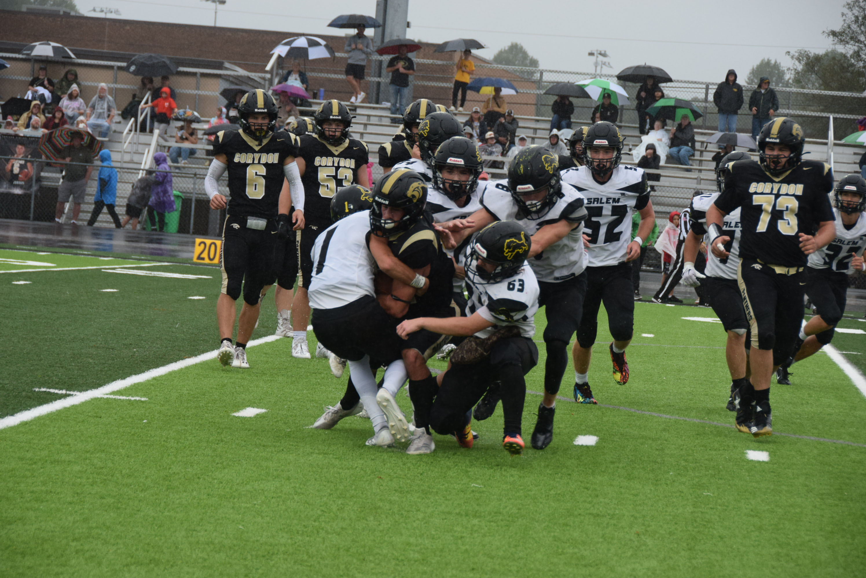 Adam Mull and a host of Lions bring down a Panther runner.